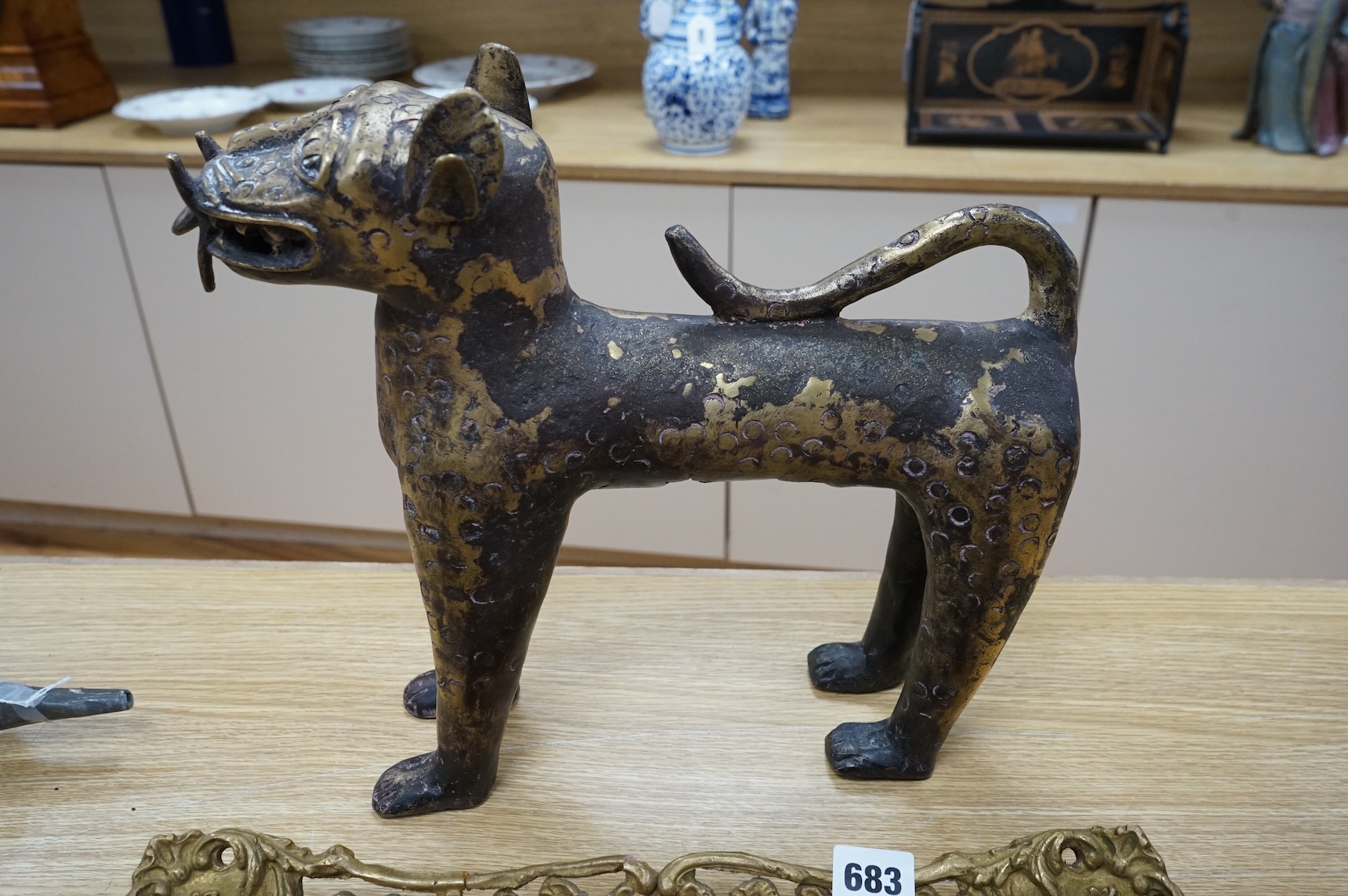 An African Benin style bronze model of a leopard, 37cm x 33cm
